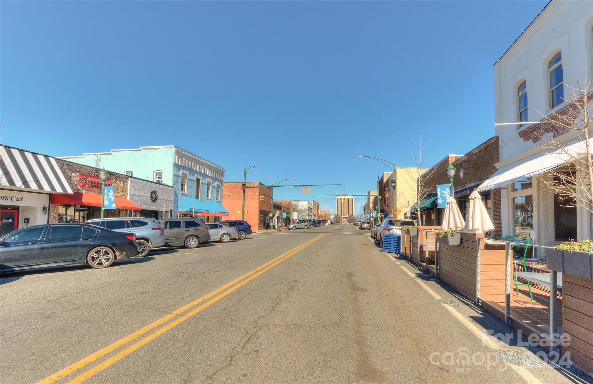 115 South Main Street, Unit 202 Monroe, NC 28112 - Photo 25 of 25 a view of a street with cars