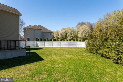 a house view with a backyard space