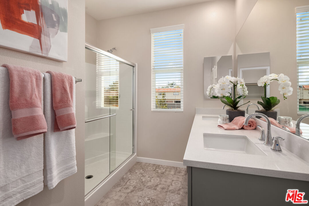 170 Tarragon Way Upland, CA 91786 - Photo 9 of 17 a bathroom with a sink a vanity and a mirror