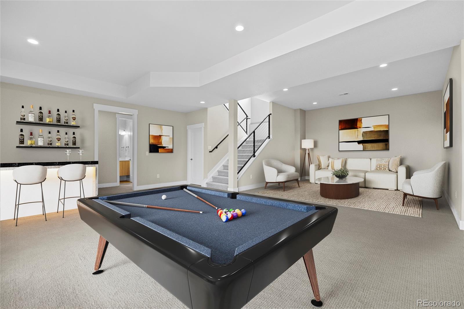 10205 Inspiration Drive Parker, CO 80138 - Photo 34 of 50 a living room with furniture pool table and a flat screen tv