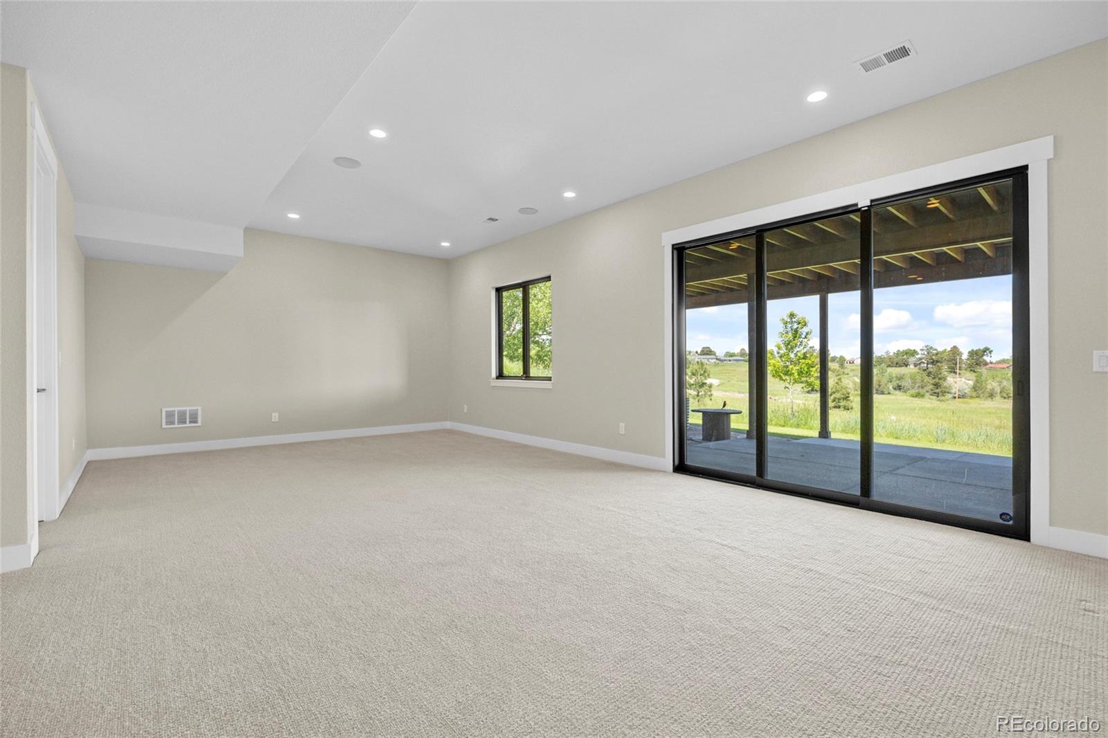 10205 Inspiration Drive Parker, CO 80138 - Photo 35 of 50 an empty room with windows