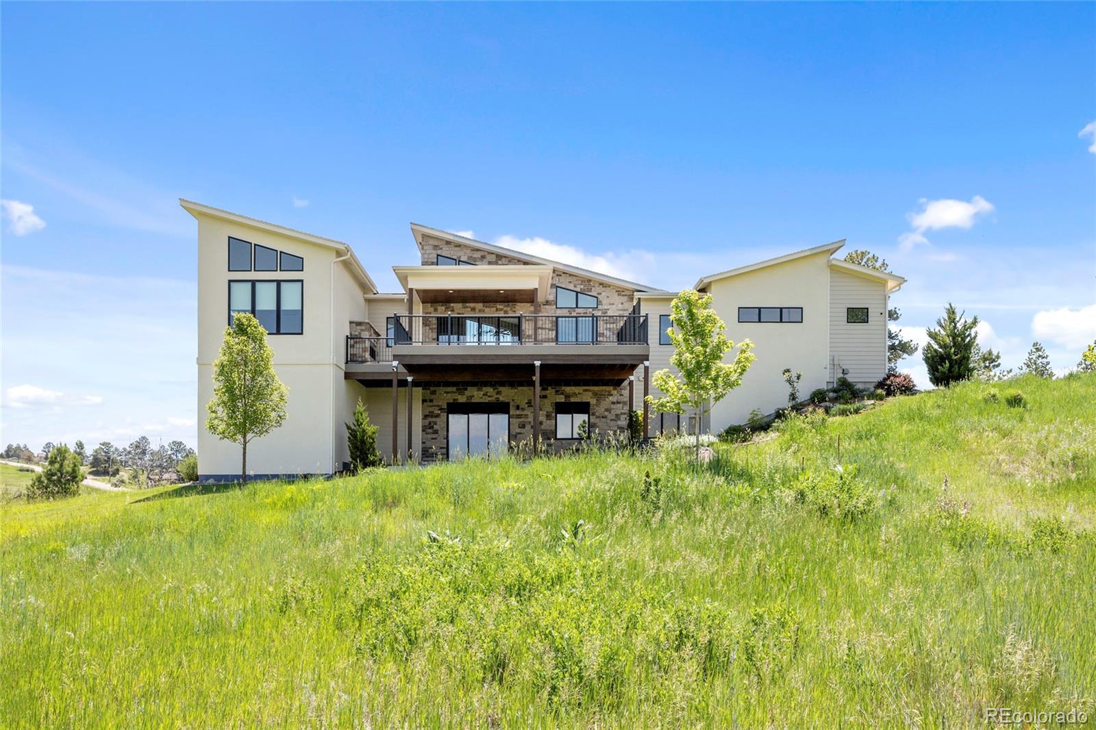 10205 Inspiration Drive Parker, CO 80138 - Photo 46 of 50 a house view with a garden space