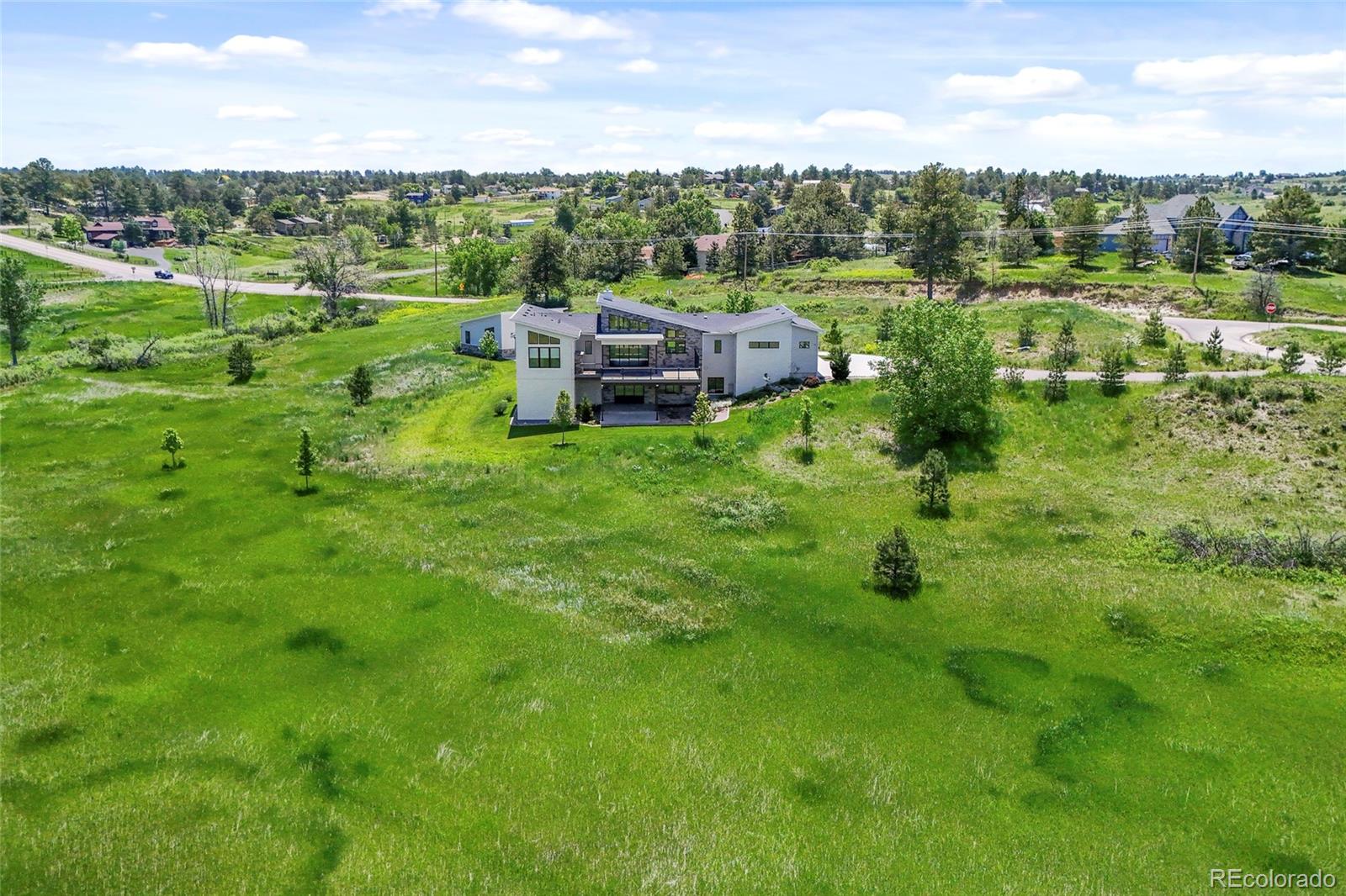10205 Inspiration Drive Parker, CO 80138 - Photo 50 of 50 a view of a garden with an outdoor space
