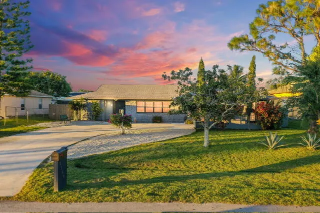 a view of a swimming pool with an outdoor space and seating area