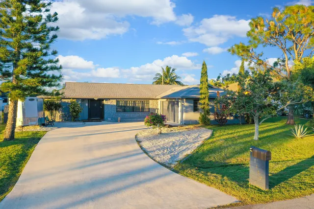 a view of a swimming pool with a patio