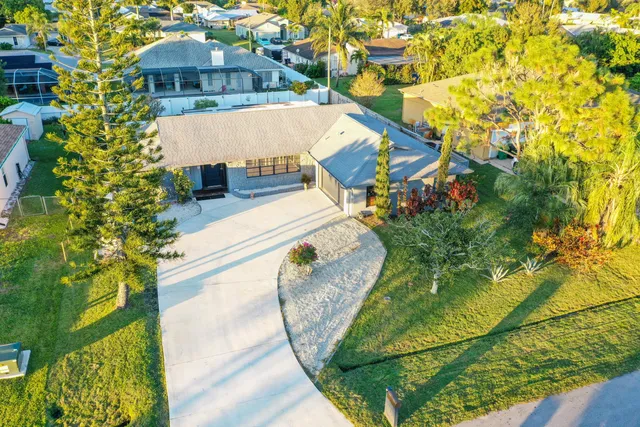 a view of a swimming pool with a patio