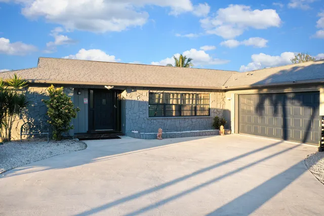a view of house with outdoor space