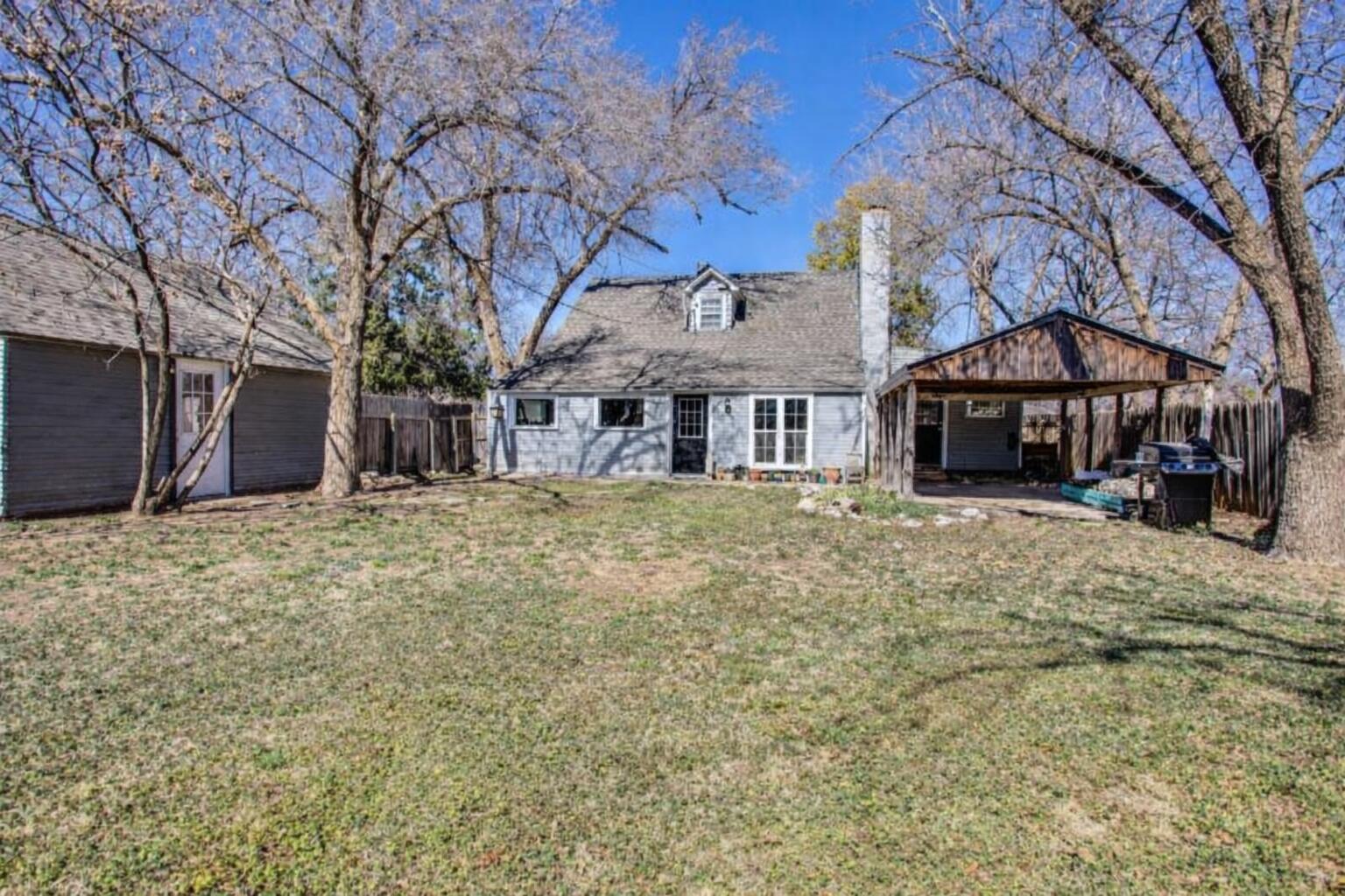 2515 25th Street Lubbock, TX 79410 - Photo 2 of 2 a front view of a house with a yard