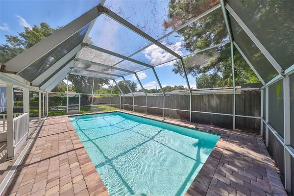 a view of a backyard with a deck
