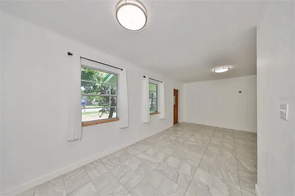 an empty room with windows