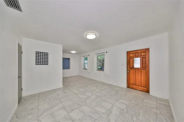 an empty room with windows