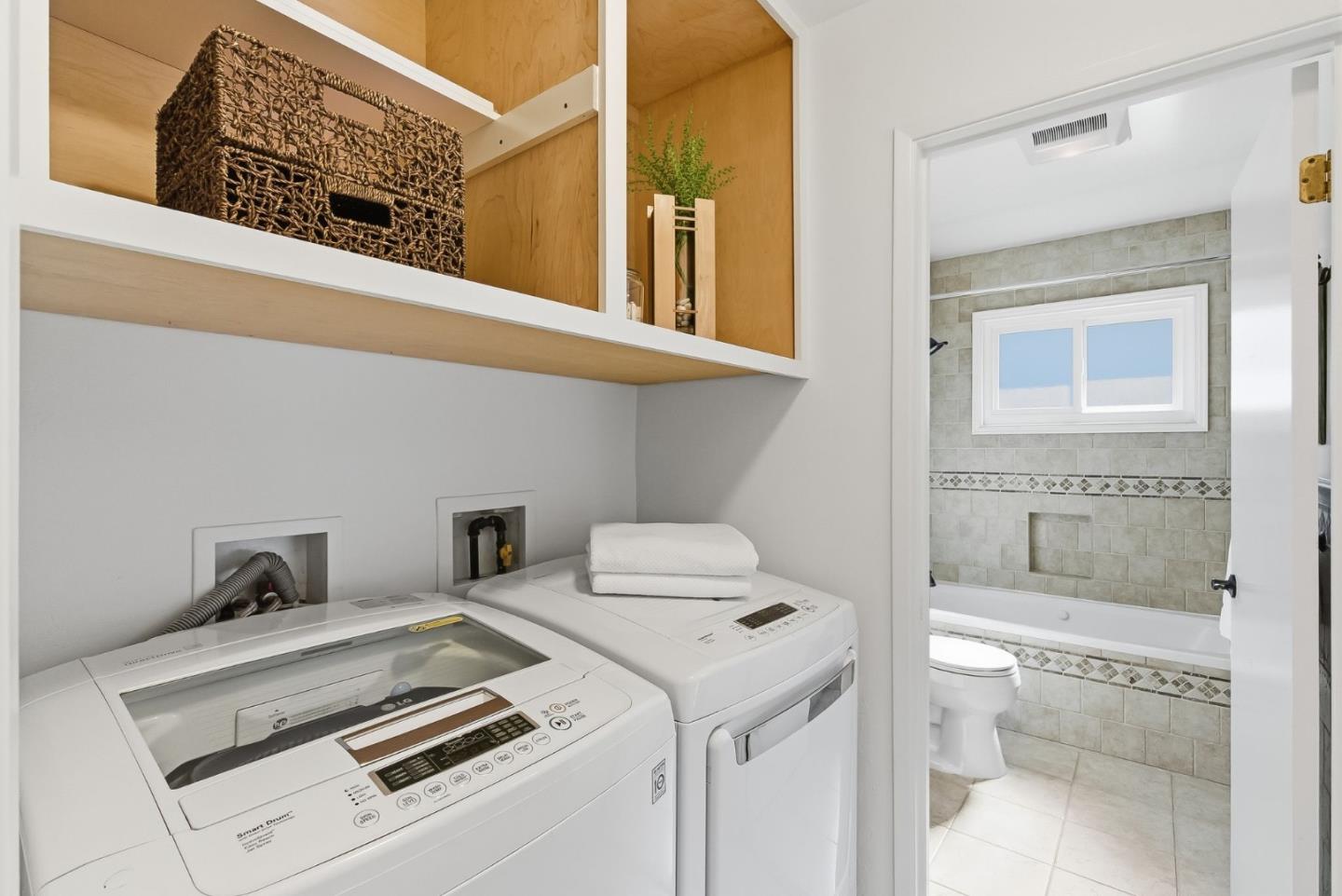 1345 Tuolumne Road Millbrae, CA 94030 - Photo 14 of 44 a utility room with dryer and washer