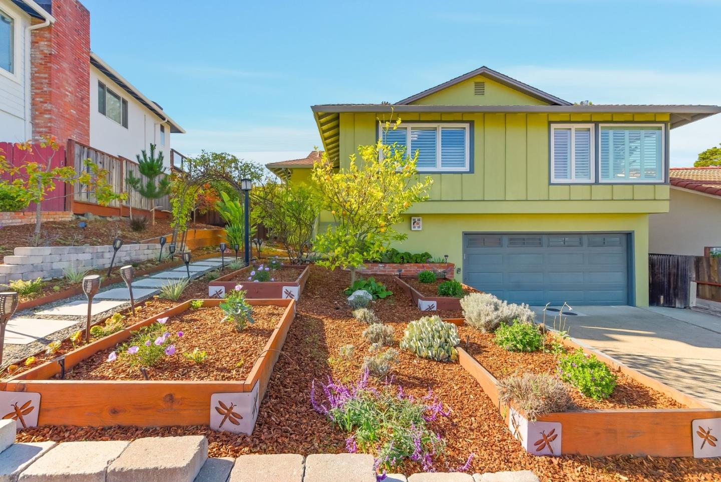 1345 Tuolumne Road Millbrae, CA 94030 - Photo 2 of 44 a front view of a house with a yard