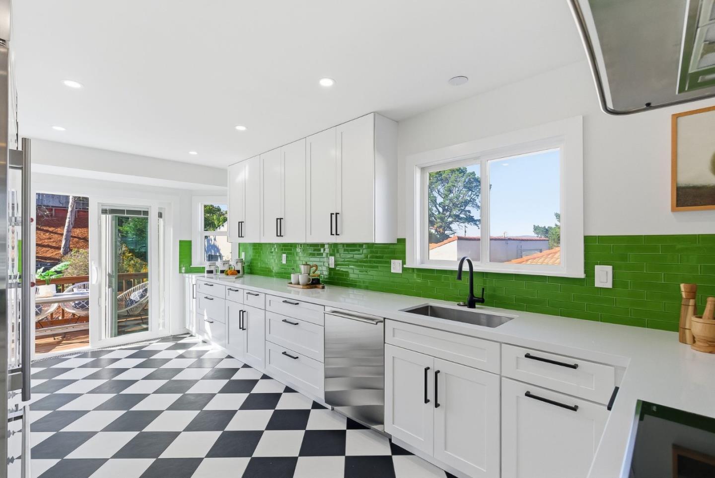 1345 Tuolumne Road Millbrae, CA 94030 - Photo 23 of 44 a kitchen with a refrigerator and a sink