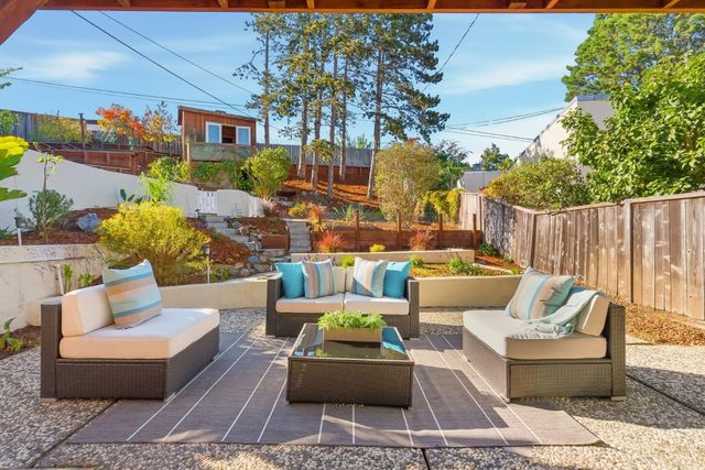 a outdoor living space with patio furniture