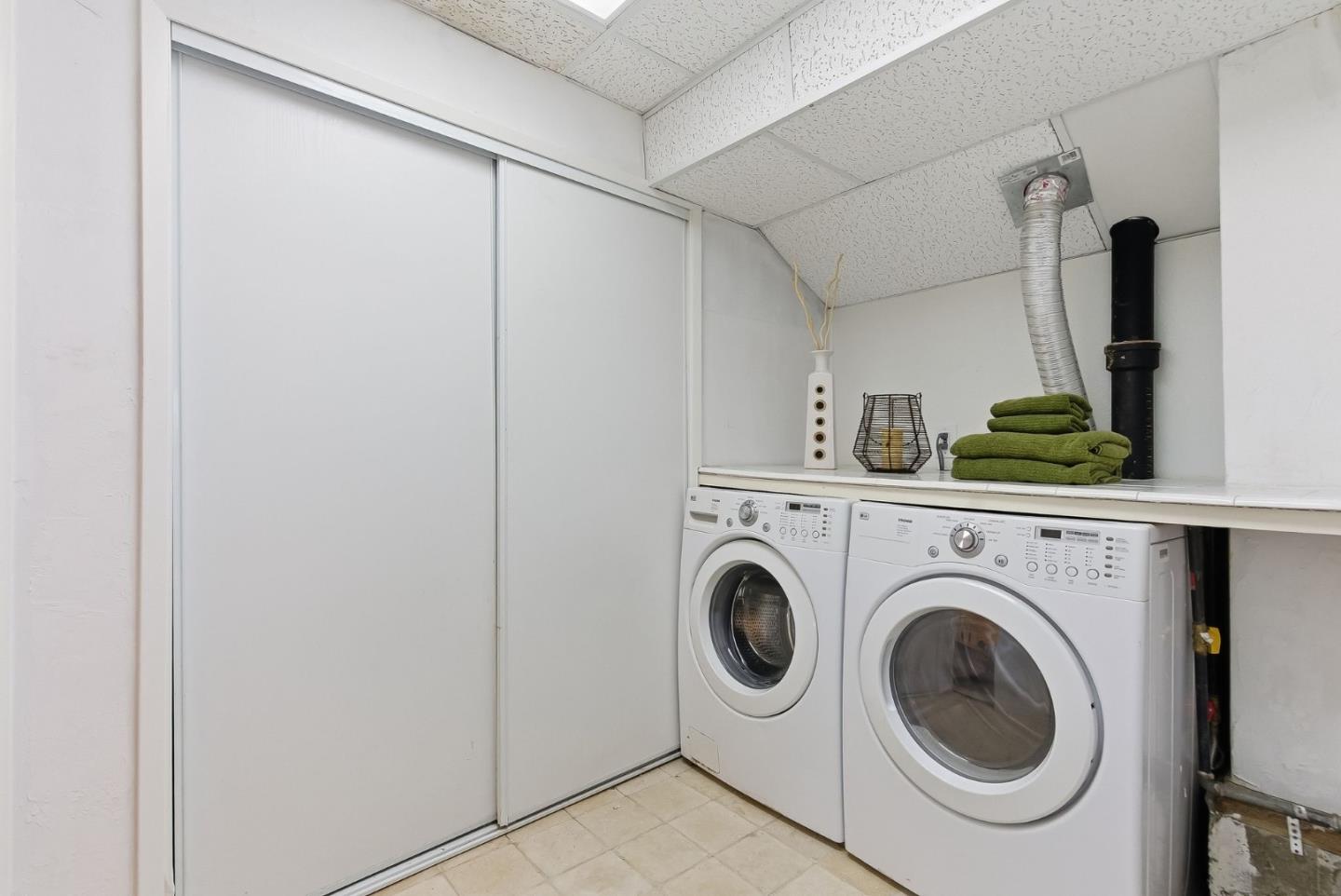 1345 Tuolumne Road Millbrae, CA 94030 - Photo 39 of 44 a utility room with dryer and washer