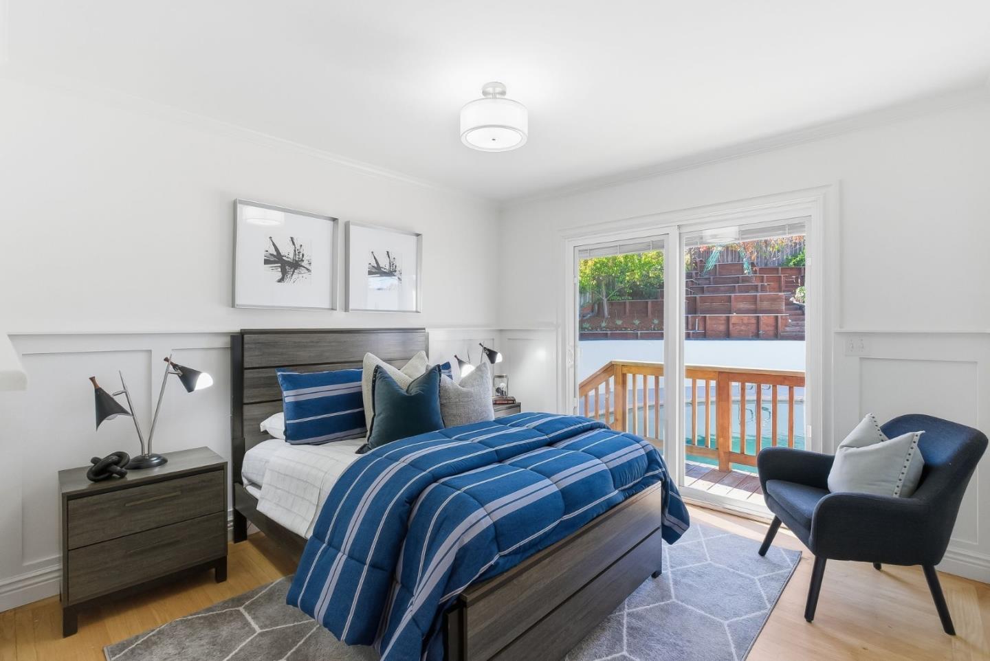 1345 Tuolumne Road Millbrae, CA 94030 - Photo 9 of 44 a bedroom with a bed and wooden floor