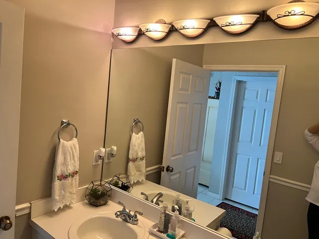 a bathroom with a sink and toilet