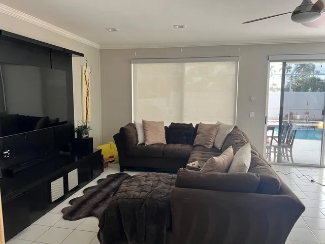 a bathroom with a double vanity sink mirror and bathtub