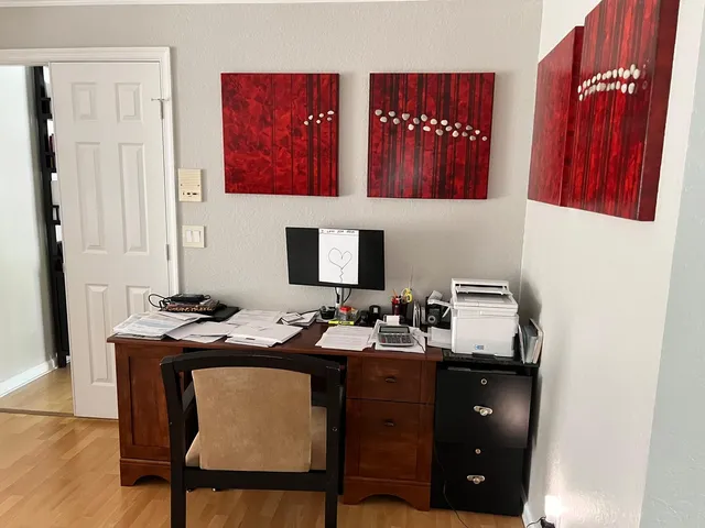 a view of living room and kitchen