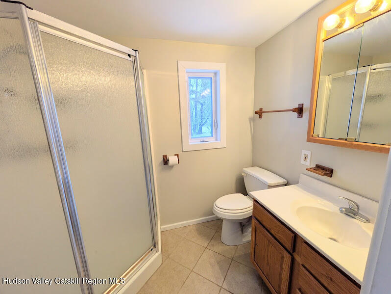 474 Dibble Road Hobart, NY 13788 - Photo 17 of 29 a bathroom with a sink and a mirror