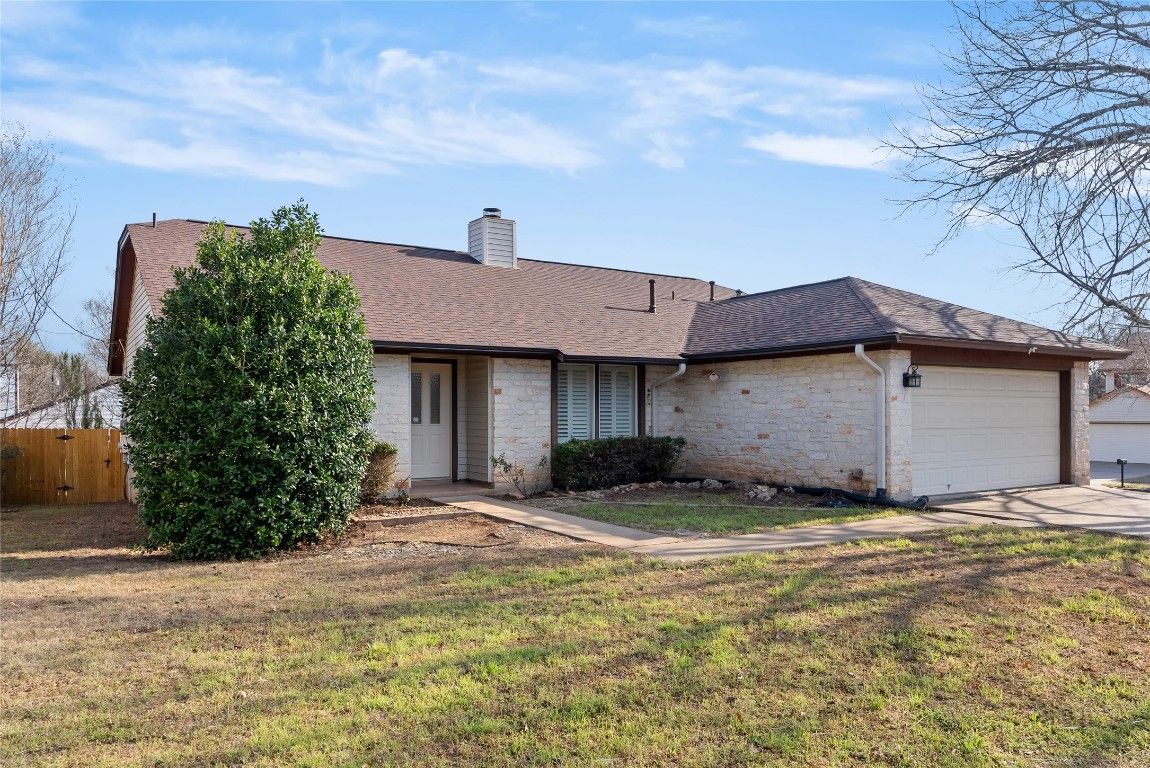 4100 Tamarack Trail Austin, TX 78727 - Photo 1 of 1 a front view of a house with a yard