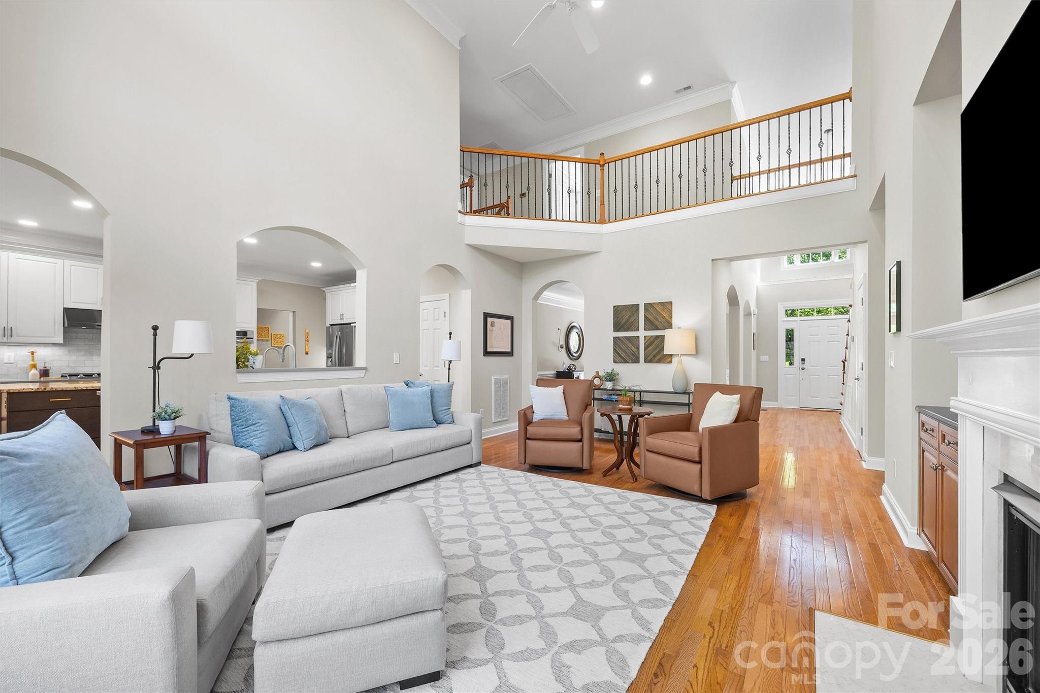 5103 Trinity Trace Lane Monroe, NC 28110 - Photo 11 of 48 a living room with furniture and a flat screen tv