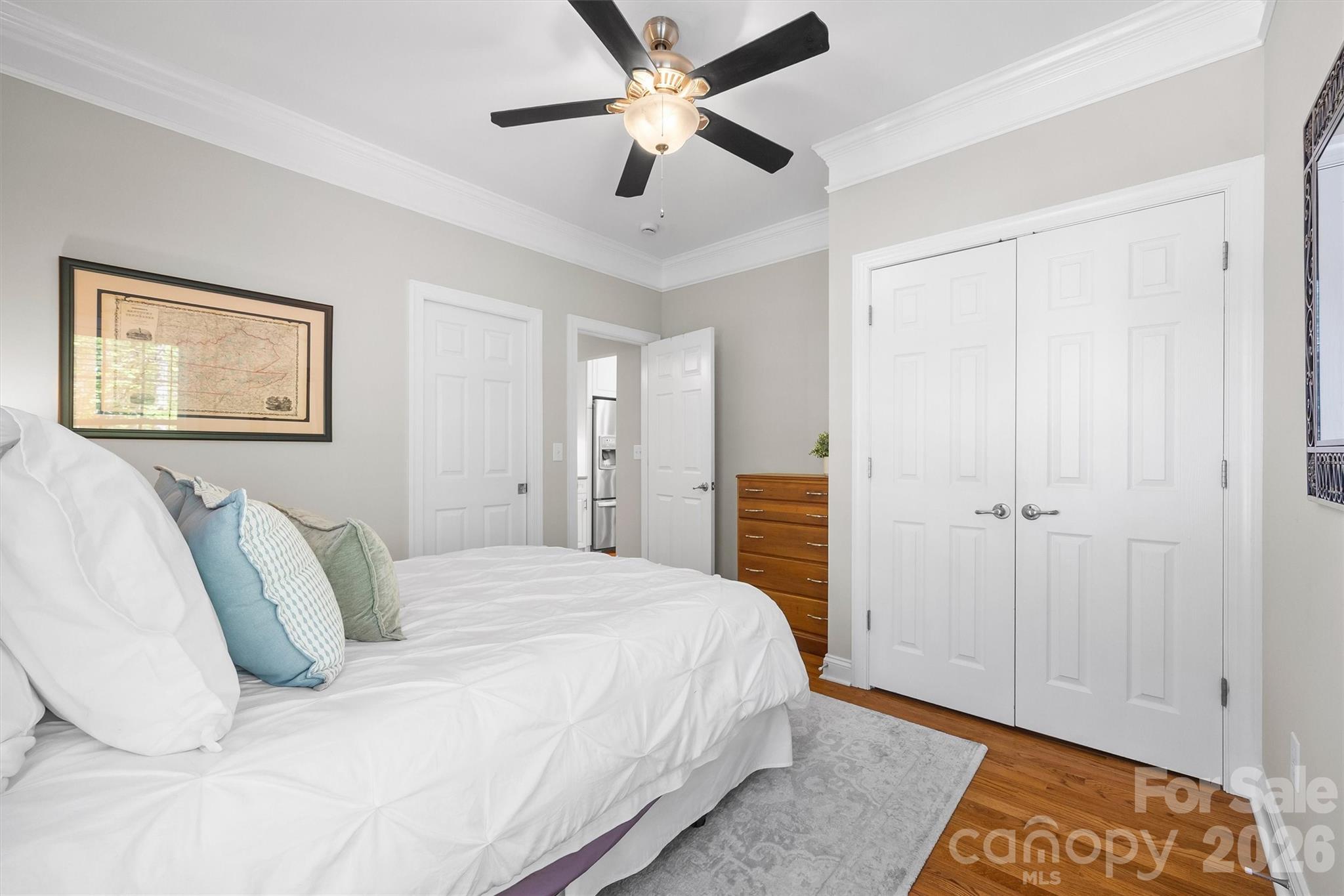 5103 Trinity Trace Lane Monroe, NC 28110 - Photo 18 of 48 a bedroom with a bed and a painting on the wall