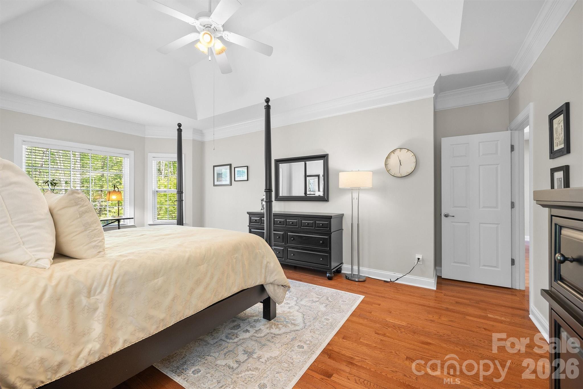 5103 Trinity Trace Lane Monroe, NC 28110 - Photo 23 of 48 a bedroom with a large bed and a flat tv screen