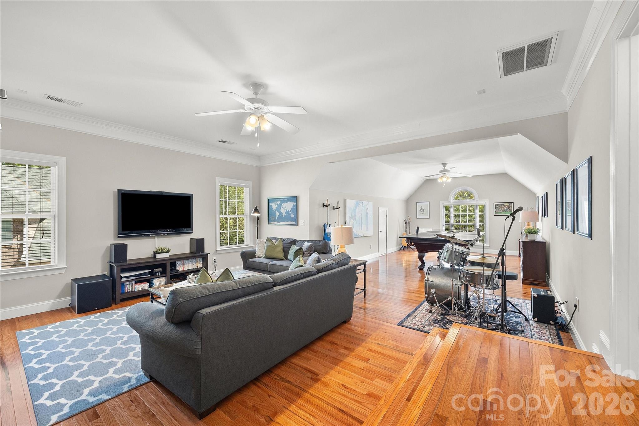 5103 Trinity Trace Lane Monroe, NC 28110 - Photo 30 of 48 a living room with furniture and a flat screen tv