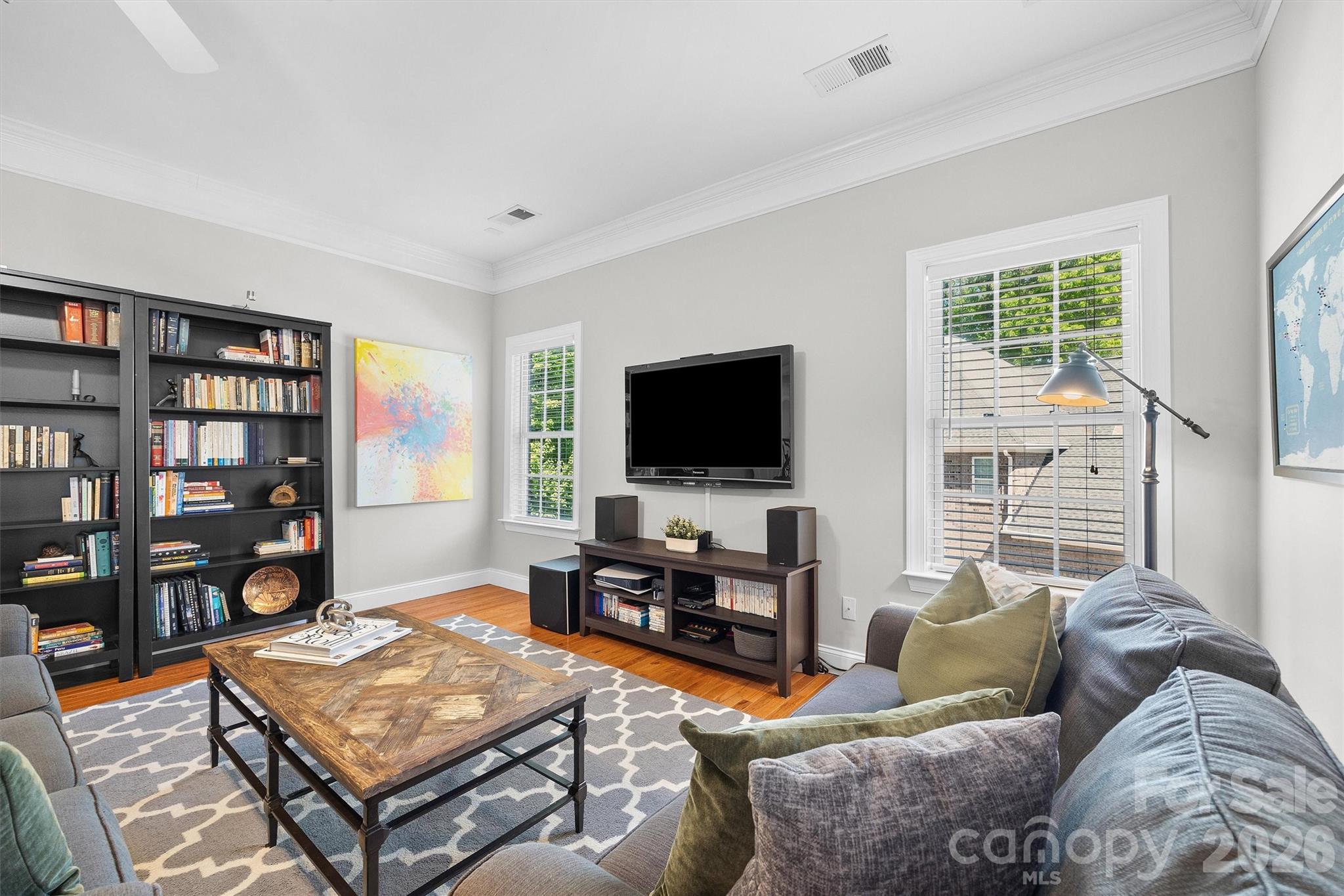 5103 Trinity Trace Lane Monroe, NC 28110 - Photo 32 of 48 a living room with furniture and a flat screen tv