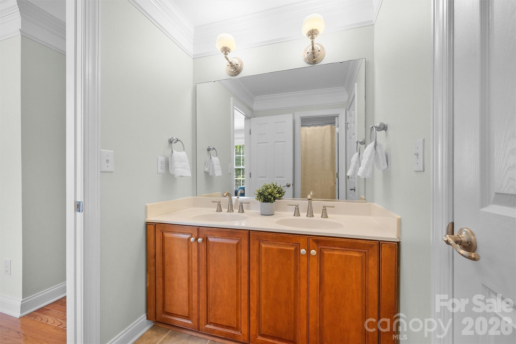 5103 Trinity Trace Lane Monroe, NC 28110 - Photo 34 of 48 a bathroom with a granite countertop sink and a mirror