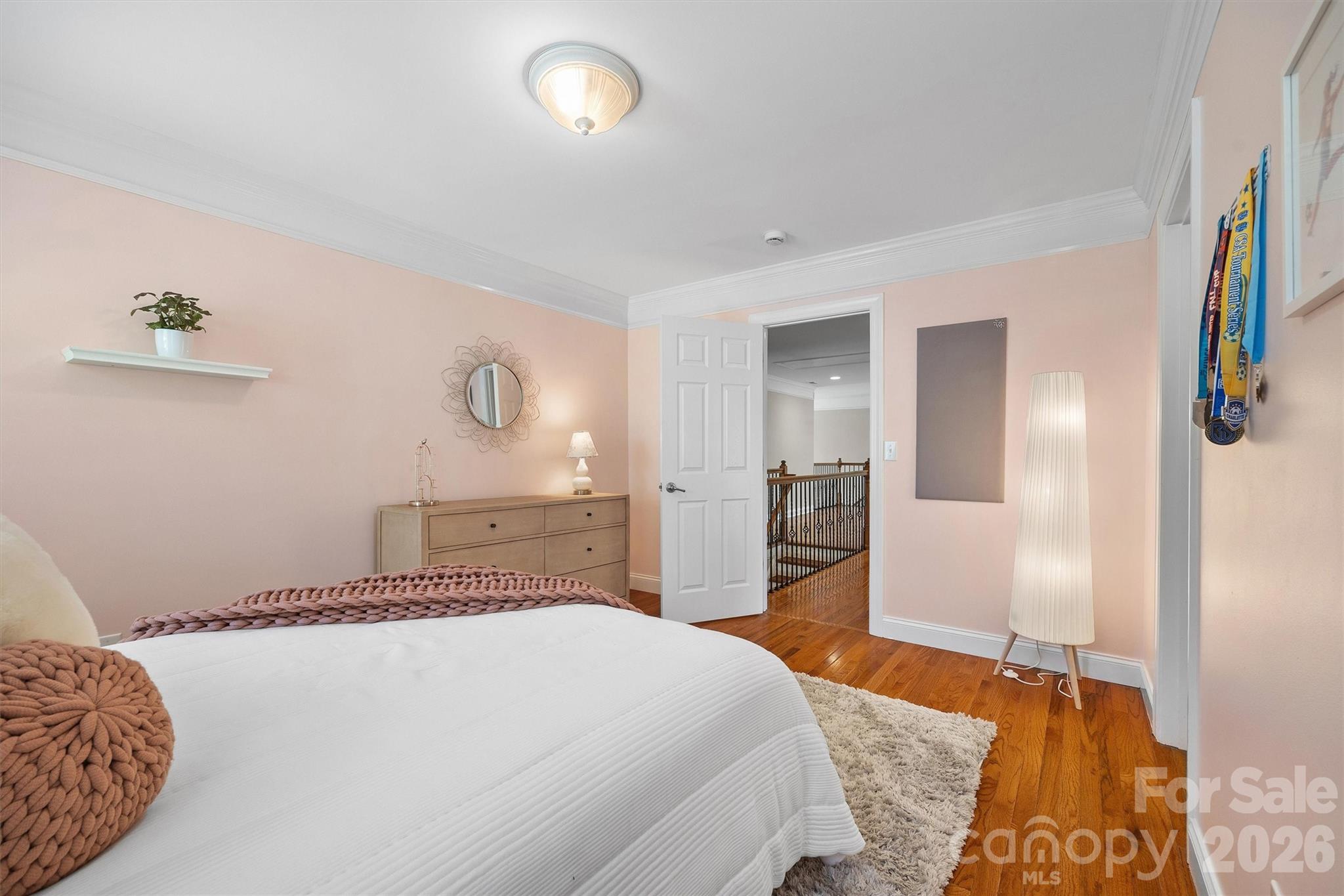 5103 Trinity Trace Lane Monroe, NC 28110 - Photo 36 of 48 a bedroom with a bed and a dresser