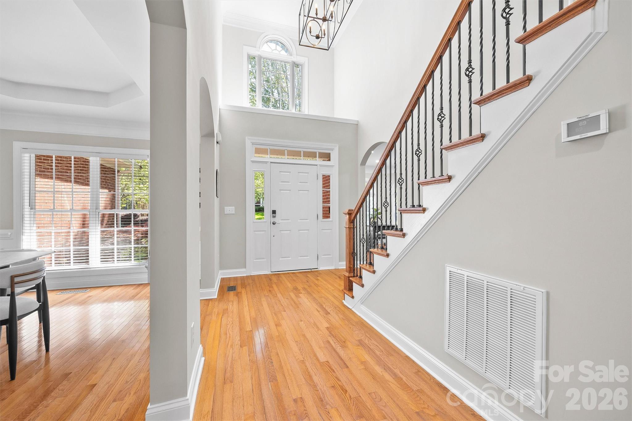 5103 Trinity Trace Lane Monroe, NC 28110 - Photo 4 of 48 a view of entryway and hall with wooden floor