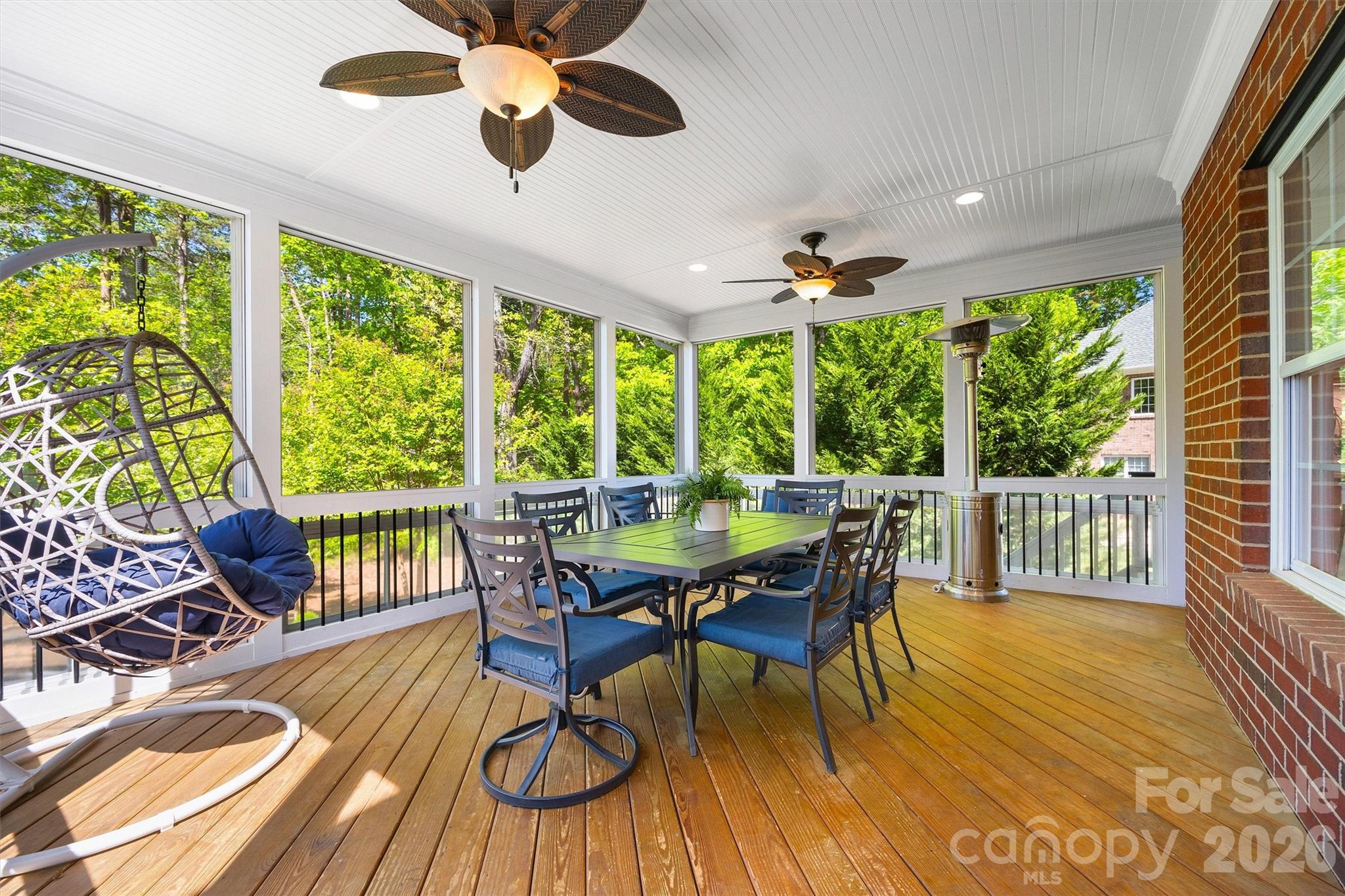 5103 Trinity Trace Lane Monroe, NC 28110 - Photo 41 of 48 a view of a dining room with furniture window and wooden floor