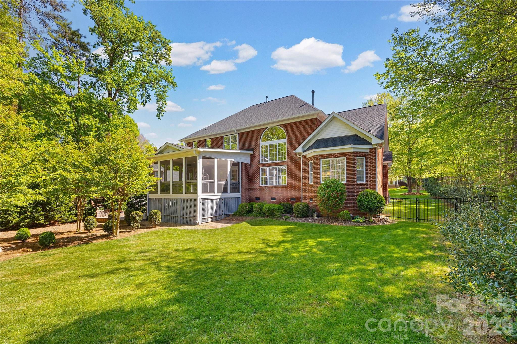 5103 Trinity Trace Lane Monroe, NC 28110 - Photo 46 of 48 a view of a yard in front of a house with large tree