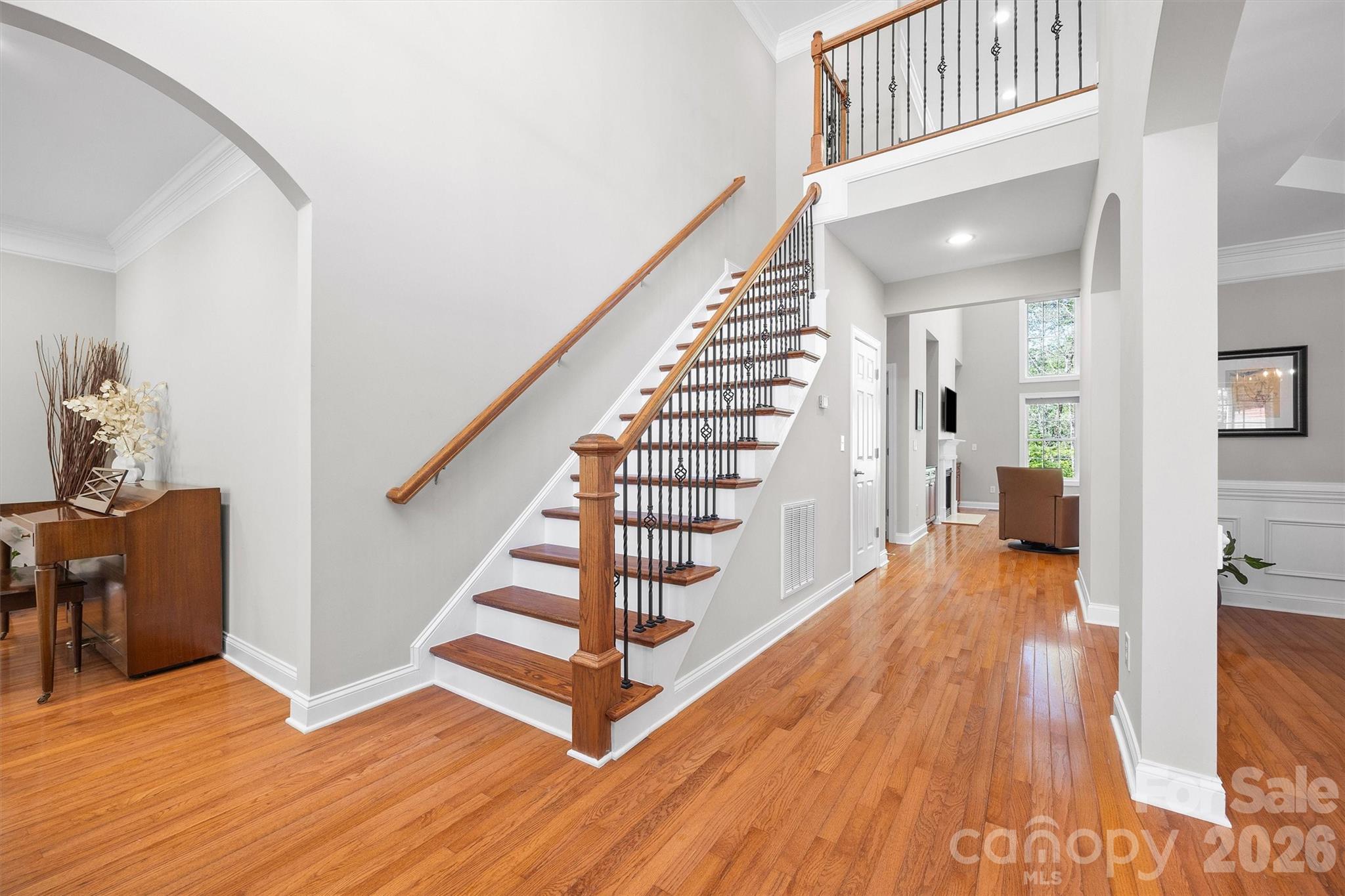 5103 Trinity Trace Lane Monroe, NC 28110 - Photo 5 of 48 a view of entryway and hall with wooden floor