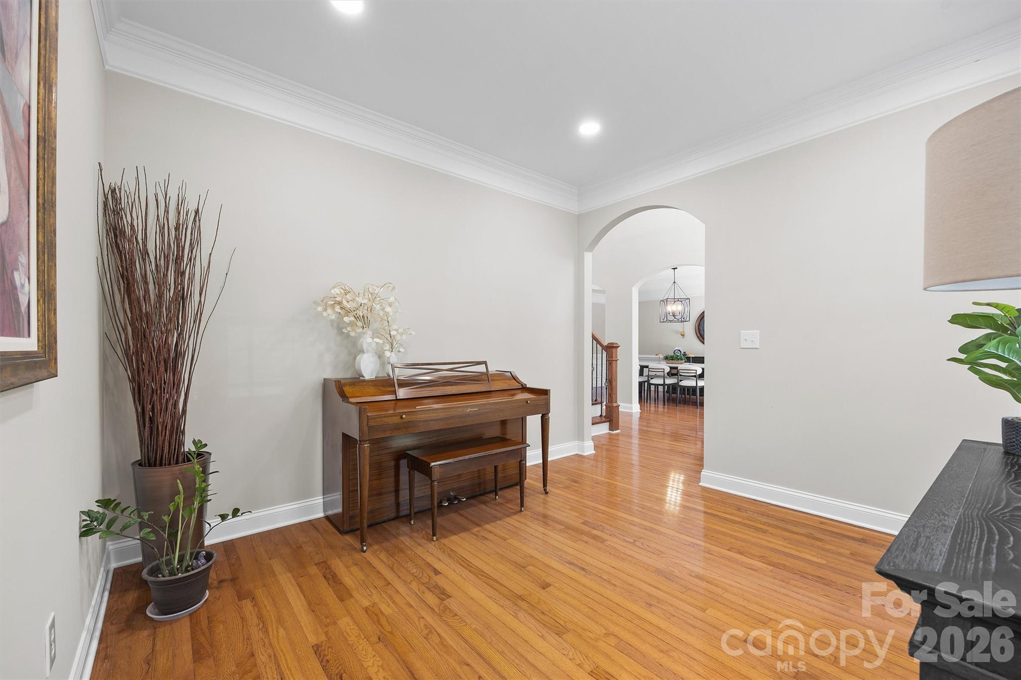 5103 Trinity Trace Lane Monroe, NC 28110 - Photo 7 of 48 a room with furniture and a wooden floor