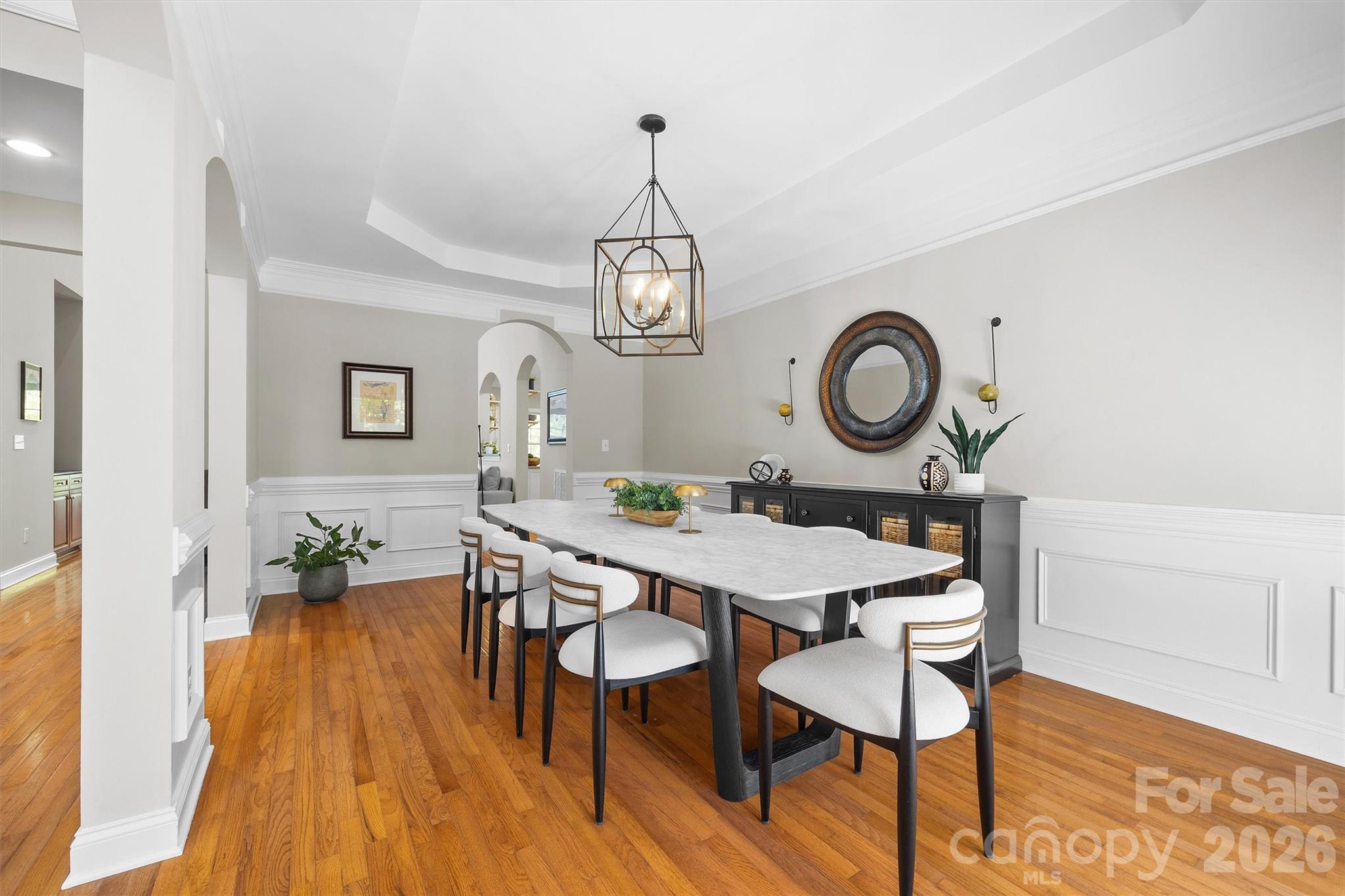 5103 Trinity Trace Lane Monroe, NC 28110 - Photo 8 of 48 a view of a dining room with furniture window and wooden floor