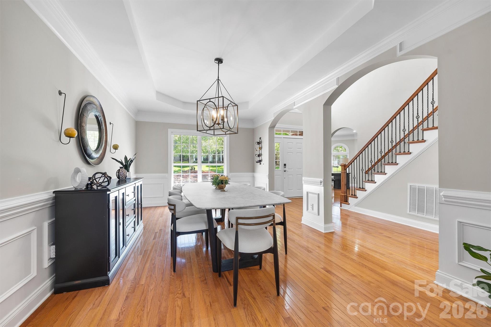 5103 Trinity Trace Lane Monroe, NC 28110 - Photo 9 of 48 a view of a dining room with furniture window and wooden floor