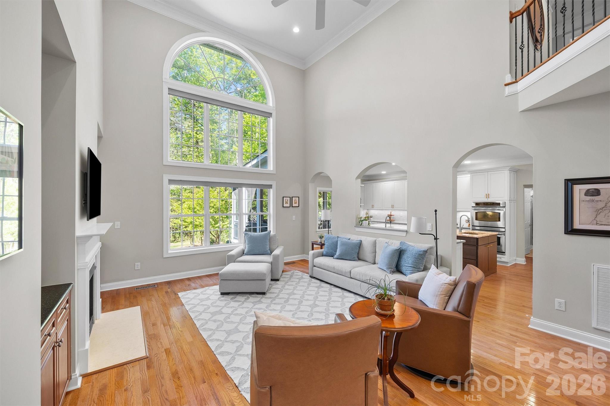 5103 Trinity Trace Lane Monroe, NC 28110 - Photo 10 of 48 a living room with furniture and a flat screen tv