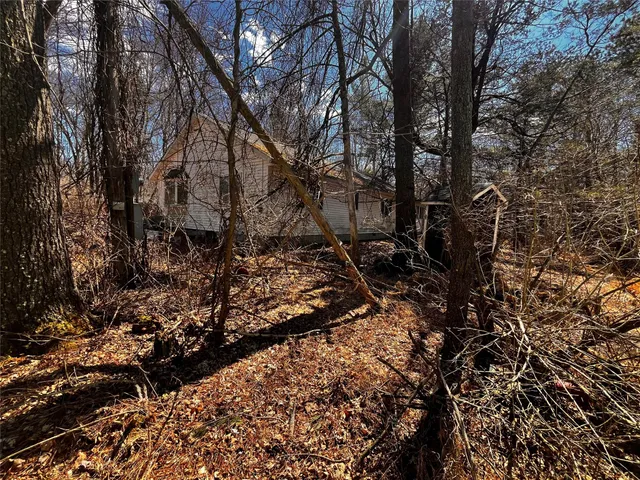 a view of outdoor space with lots of trees