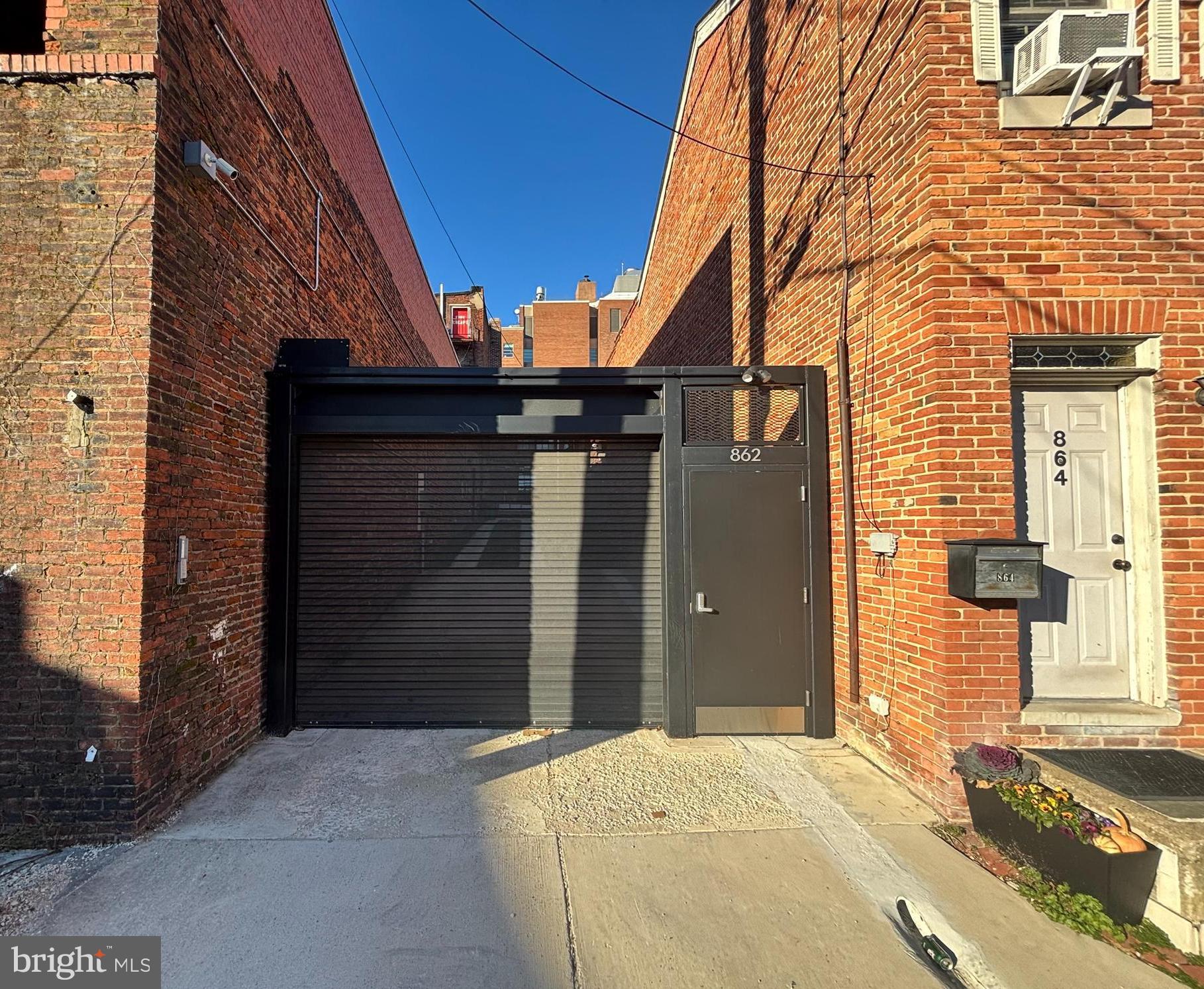 862 Tyson Street Baltimore, MD 21201 - Photo 14 of 62 a front view of a house with a yard