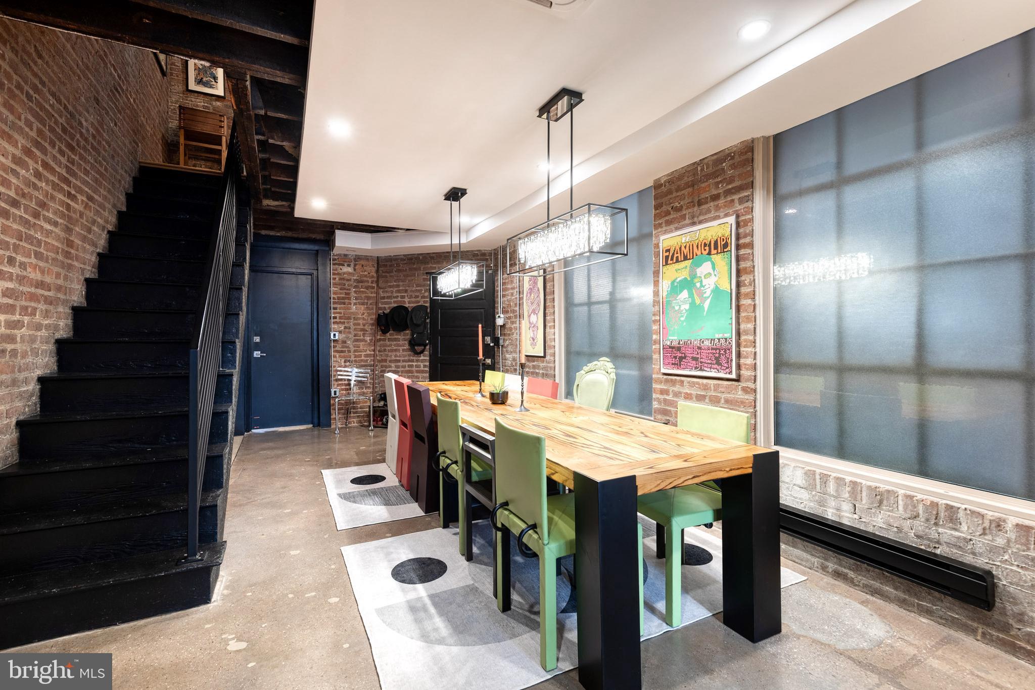 862 Tyson Street Baltimore, MD 21201 - Photo 16 of 62 a large kitchen with a table and chairs