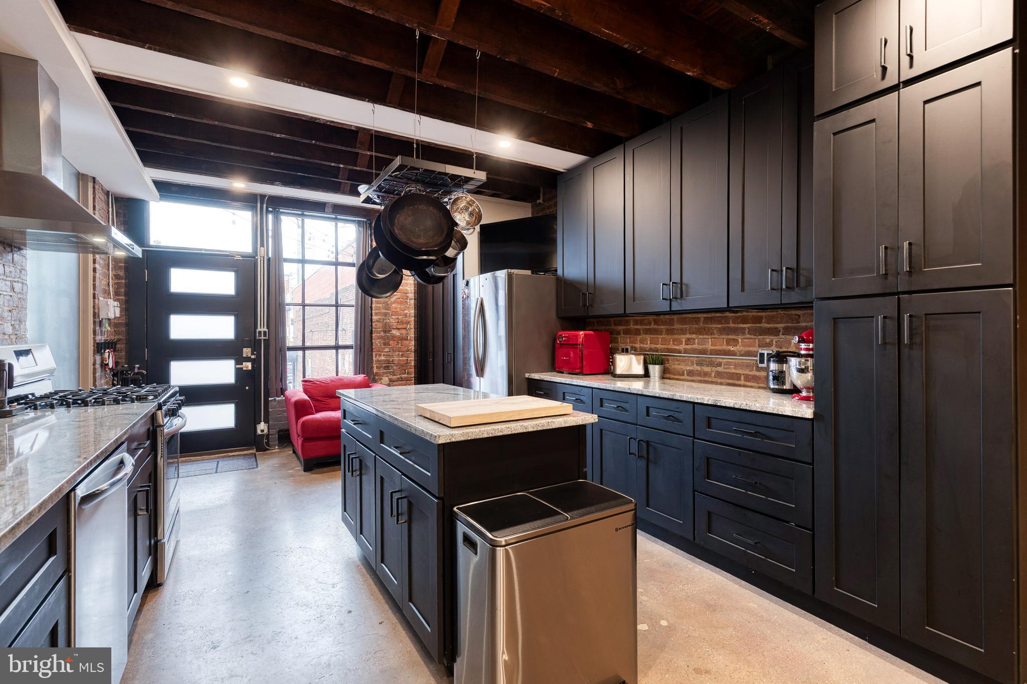 862 Tyson Street Baltimore, MD 21201 - Photo 19 of 62 a kitchen with a stove and a refrigerator