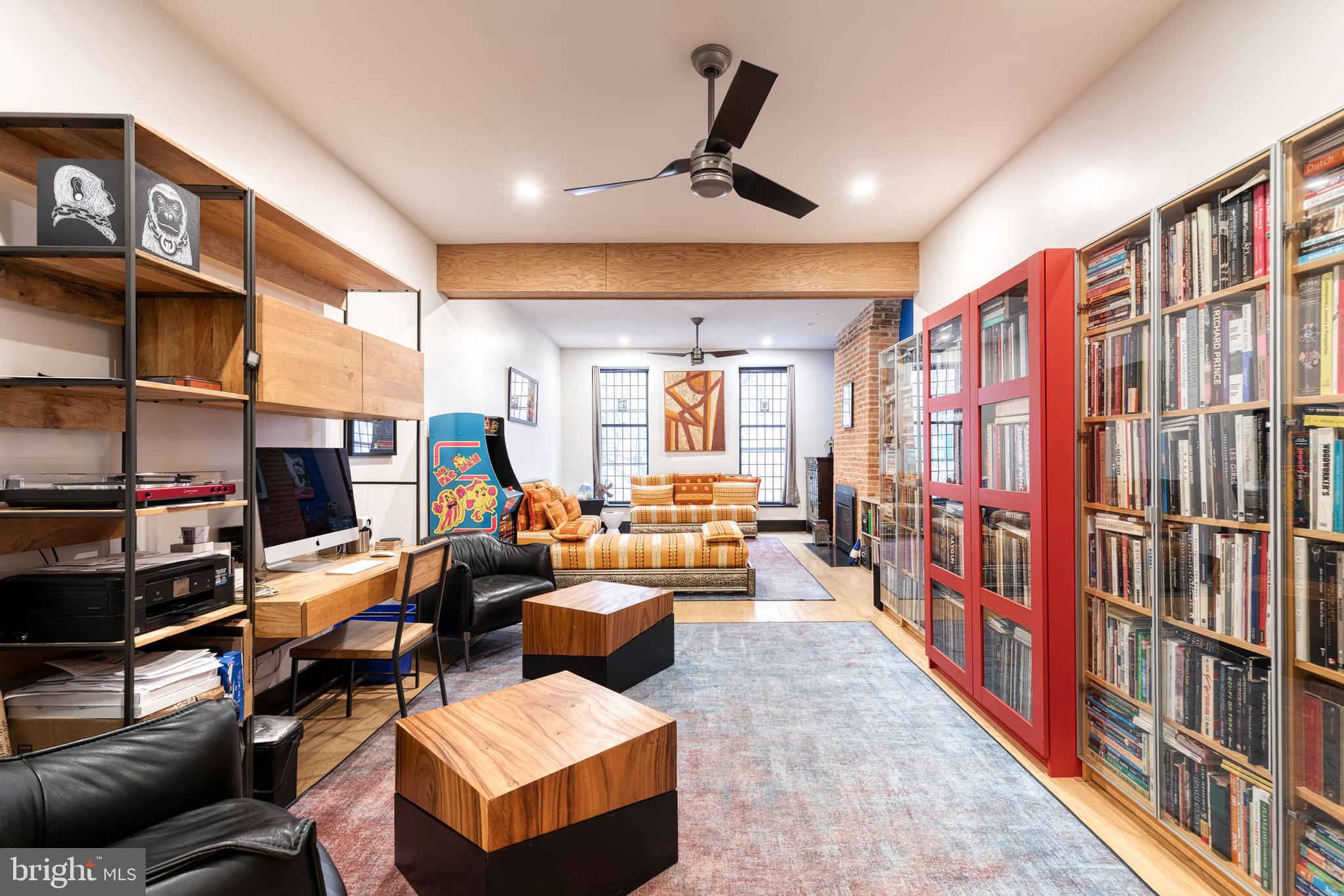 862 Tyson Street Baltimore, MD 21201 - Photo 24 of 62 a very nice looking living room with furniture and a book shelf