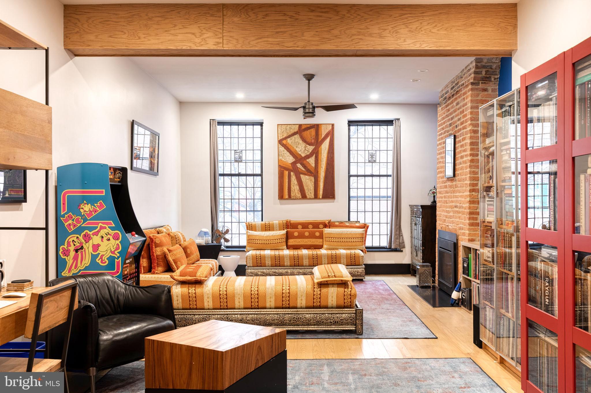 862 Tyson Street Baltimore, MD 21201 - Photo 26 of 62 a living room with furniture and a flat screen tv