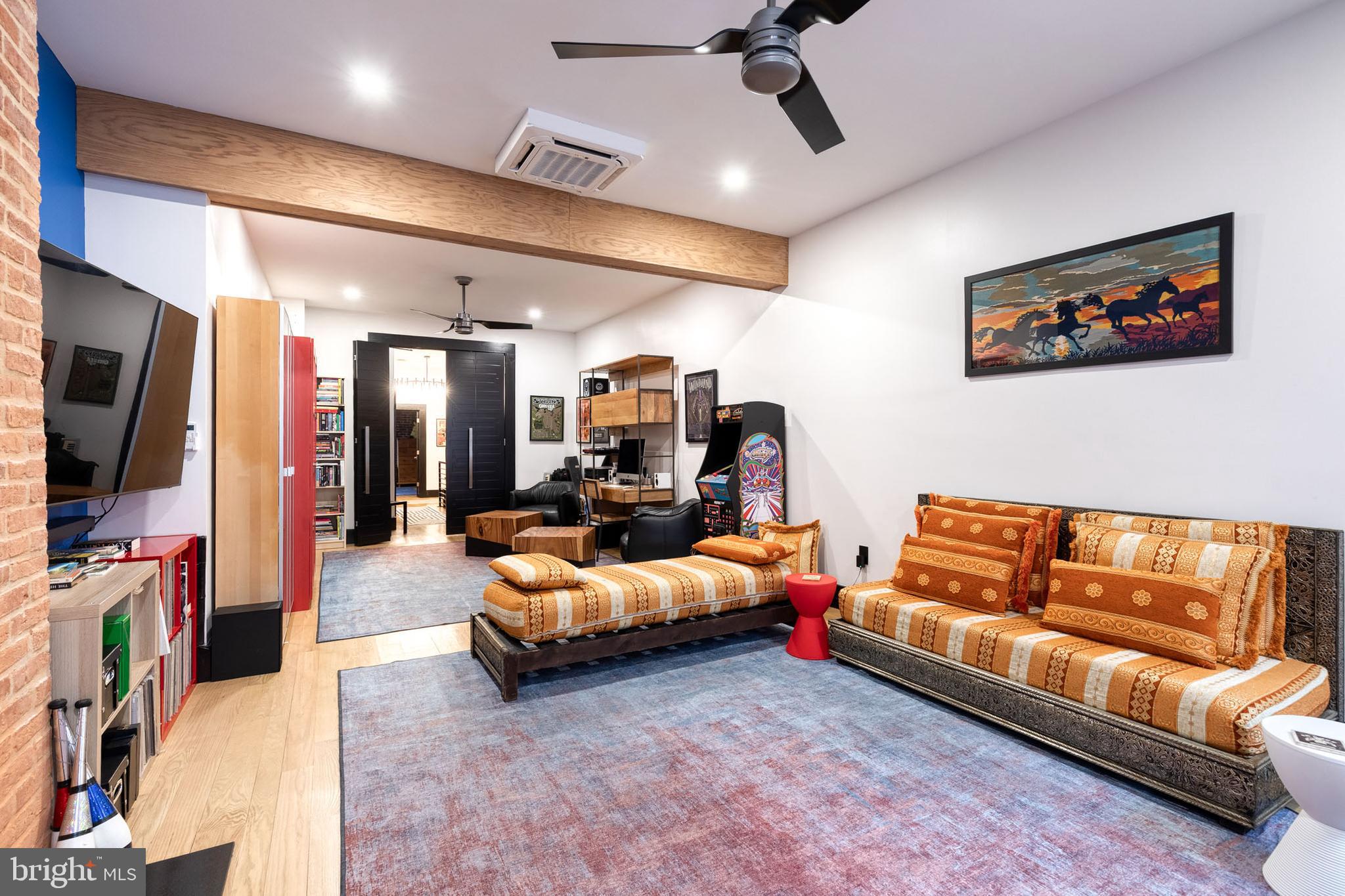 862 Tyson Street Baltimore, MD 21201 - Photo 28 of 62 a living room with furniture and a flat screen tv