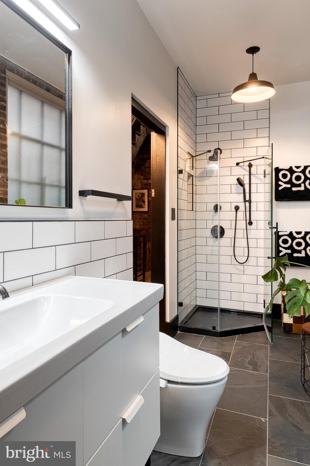 862 Tyson Street Baltimore, MD 21201 - Photo 33 of 62 a bathroom with a sink toilet and shower