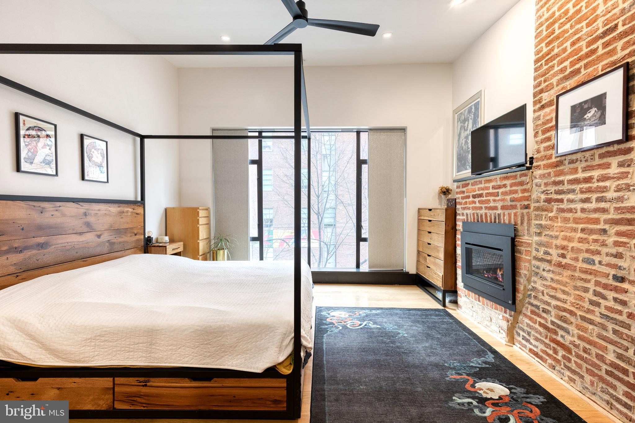 862 Tyson Street Baltimore, MD 21201 - Photo 41 of 62 a view of a livingroom with furniture and staircase
